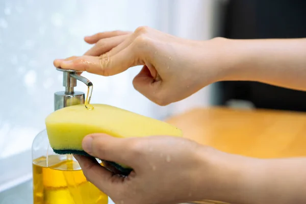 Unrecognizable Woman Pressing Dish Detergent Dispenser Bottle Yellow Sponge Close — Stock Photo, Image