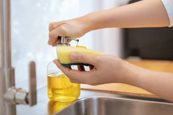Unrecognizable Woman Pressing Dish Detergent Dispenser Bottle Yellow Sponge Close — Stock Photo, Image