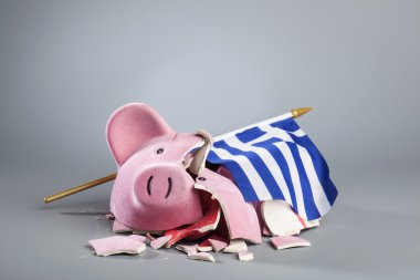 Robbed piggy bank with Greek flag clipart
