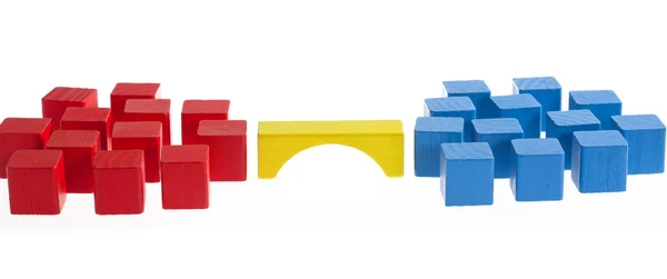 Wooden blocks concept: Bridge between two groups — Stock Photo, Image