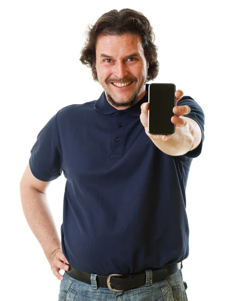 Mid-aged man in blue shirt holding smart phone — Stock Photo, Image