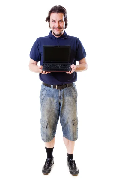 Mid-aged man in blue shirt holding netbook — Stock Photo, Image