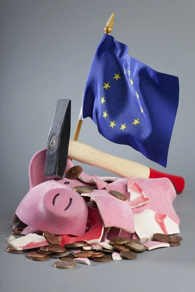 Robbed piggy bank an EU flag — Stock Photo, Image