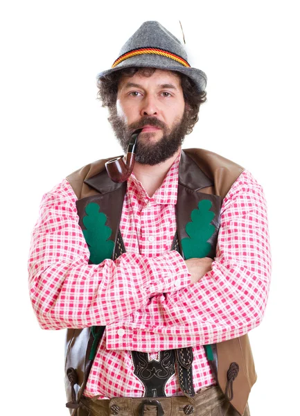 Bearded bavarian man with pipe in traditional clothing — Stock Photo, Image