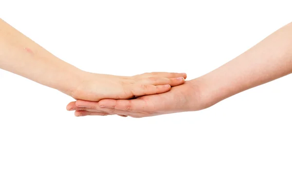Two kids' hands lying on each other, isolated white — Stock Photo, Image