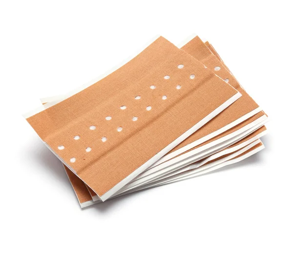 Bunch of brown band aids — Stock Photo, Image