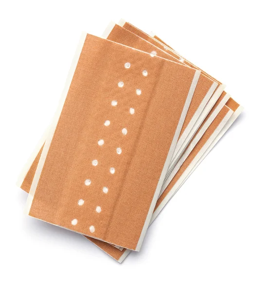 Bunch of brown band aids — Stock Photo, Image
