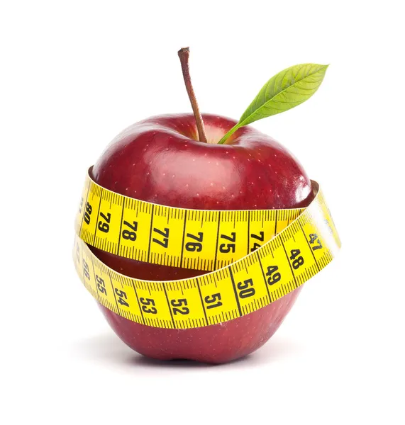 Manzana aislada con cinta métrica - Concepto de dieta —  Fotos de Stock