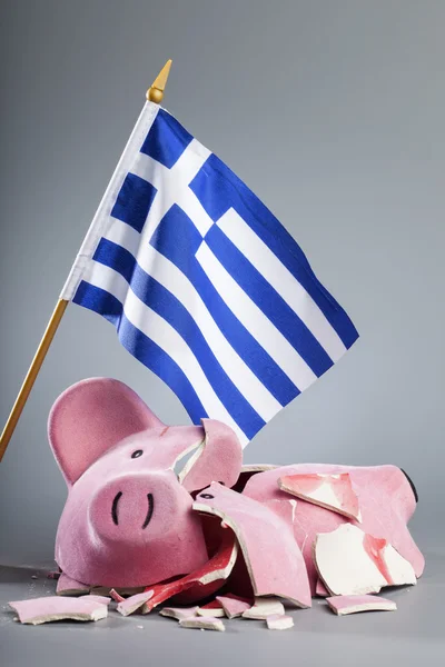 Robbed piggy bank with Greece flag — Stock Photo, Image