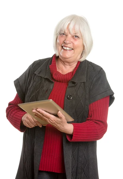 Donna anziana con tavoletta digitale isolato su bianco — Foto Stock