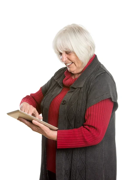 Starszy kobieta z cyfrowy tabletki - na białym tle — Zdjęcie stockowe