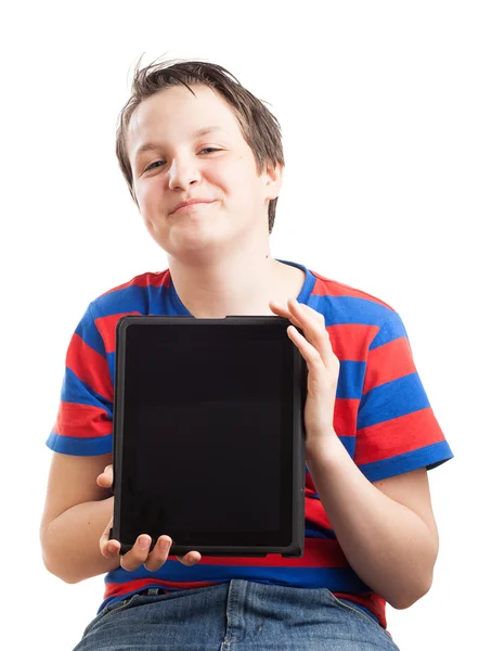 Adolescente menino segurando tablet computador — Fotografia de Stock