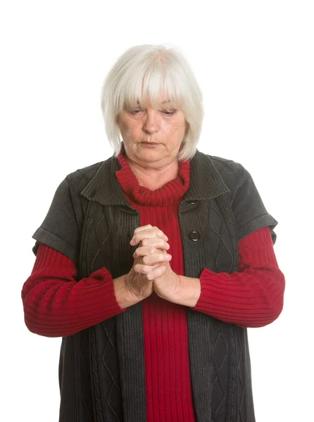 Senior Caucasian woman praying — Stock Photo, Image