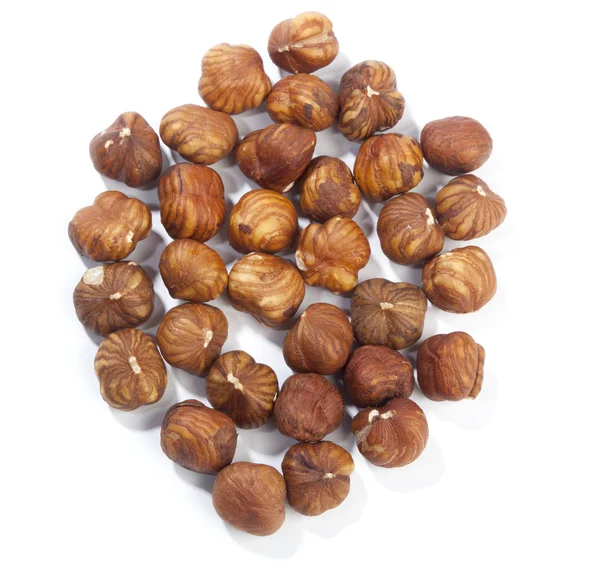 Heap of hazelnuts, isolated on white — Stock Photo, Image