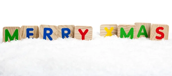 Letters Merry Xmas on snow underground — Stock Photo, Image