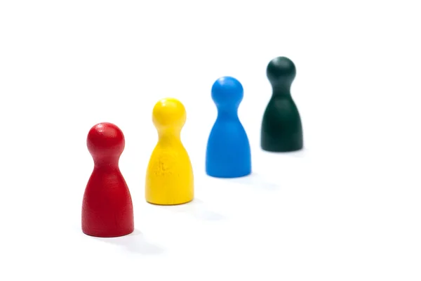 Row of multi colored play figures — Stock Photo, Image