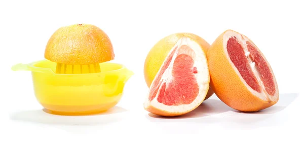 Making grapefruit juice, isolated on white — Stock Photo, Image