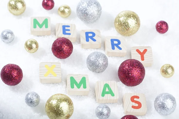 Christmas decoration balls and Merry Christmas text — Stock Photo, Image