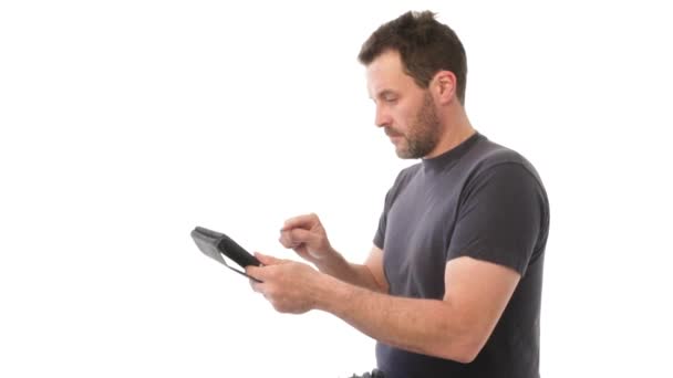 Mature man using tablet computer — Stock Video