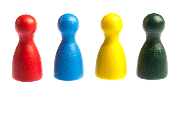 Four diverse pawn game figures — Stock Photo, Image