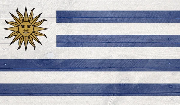 Vlajka Uruguaye na dřevěných desek s nehty — Stock fotografie