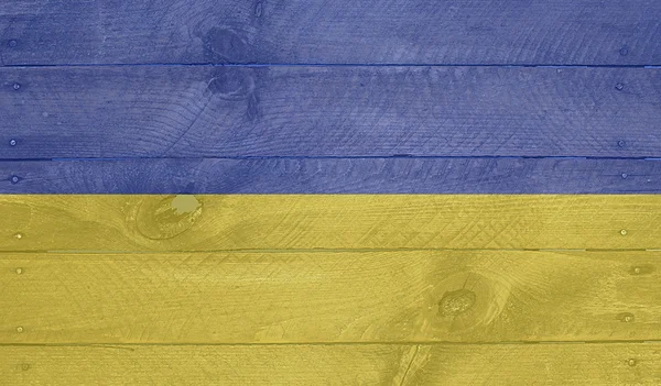 Flaga Ukrainy na drewno deski z paznokci — Zdjęcie stockowe