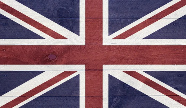 Flagi brytyjskiej na drewno deski z paznokci — Zdjęcie stockowe
