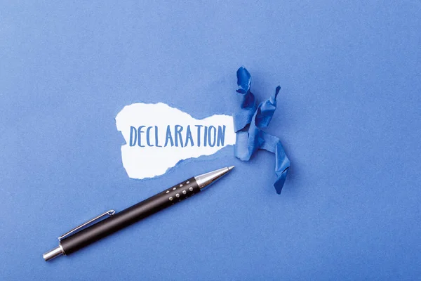 Declaration Message Torn Blue Paper Revealing Secret Ripped Opening — Stock Photo, Image