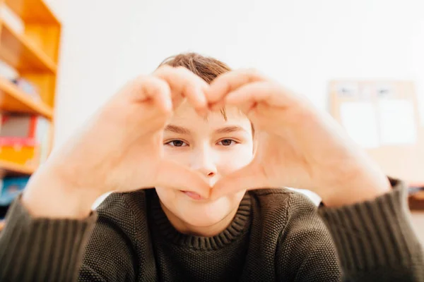 Ten Year Old School Boy Showing Heart Shape Hands Home — Stockfoto