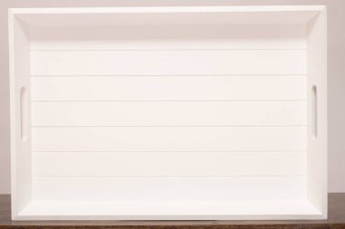 Close up to white boards of wood serving tablet with lines as background texture