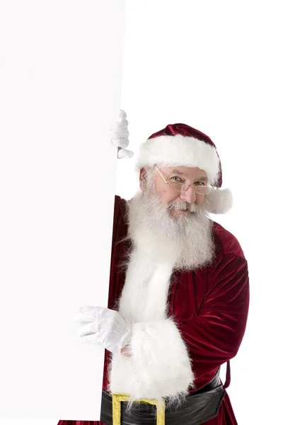 Смолящий Санта-Клаус на белом — стоковое фото