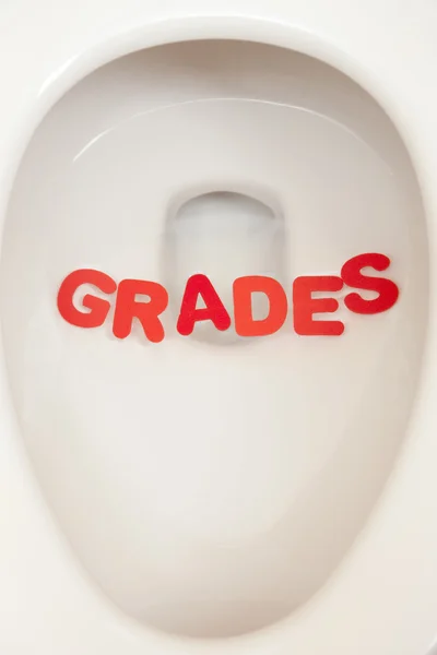 Bathroom toilet with the inscription grades — Stock Photo, Image