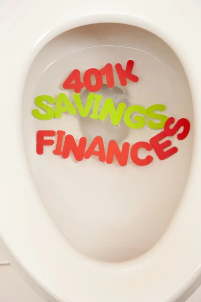 Bathroom toilet with the inscriptions savings, 401K and finances — Stock Photo, Image