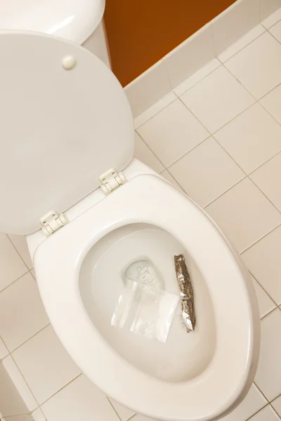 Overcoming addiction drugs in toilet — Stock Photo, Image