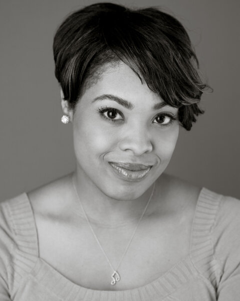 Black and white head shot of a beautiful black woman