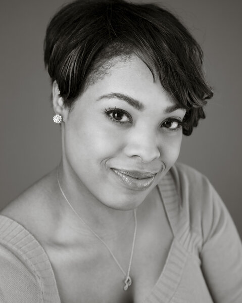 Black and white portrait of smiling pretty black woman