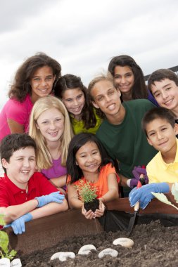 Cute ethnically diverse children working together
