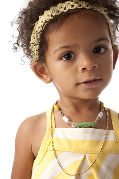 Cute girl looking at camera with a blank expression — Stock Photo, Image