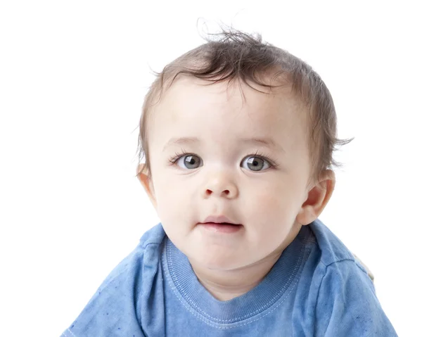 Estocástico loseup de un niño con grandes ojos verdes —  Fotos de Stock