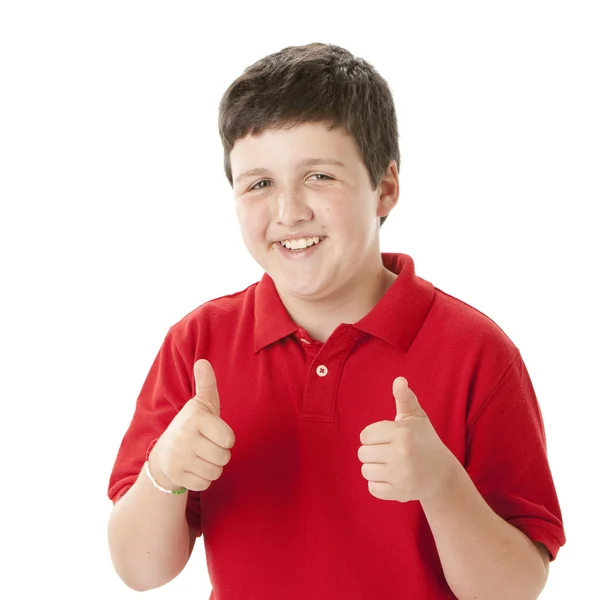 十几岁的男孩显示审批竖起两个大拇指 — 图库照片