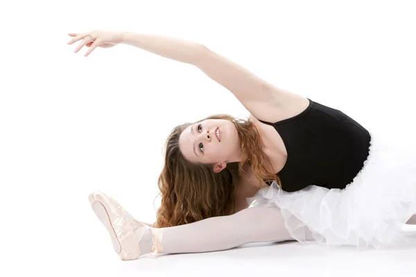 Teenage girl ballet dancer in gracefully stretching. — Stock Photo, Image