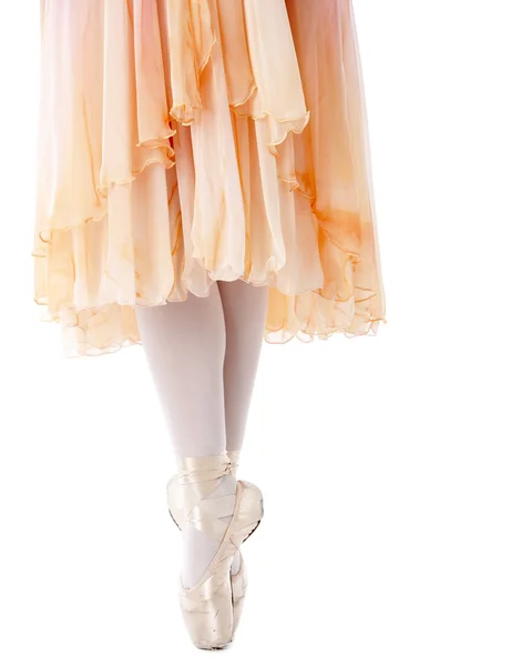 Image of the legs of a ballerina in a beautiful dress — Stock Photo, Image