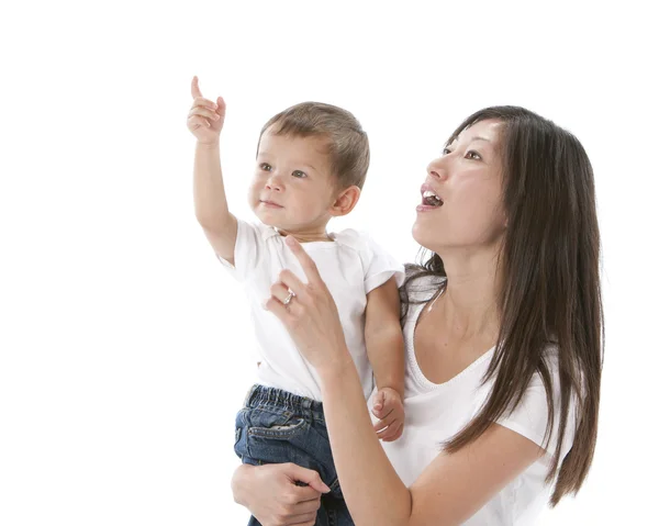 Asian mother and child look up in wonderment — Stock Photo, Image