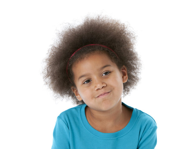 Closeup headshot of an african American little girl thinking