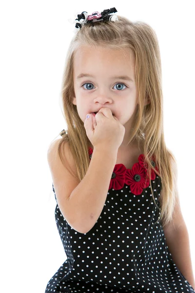 Caucasian little girl biting her fingernails — Stock Photo, Image