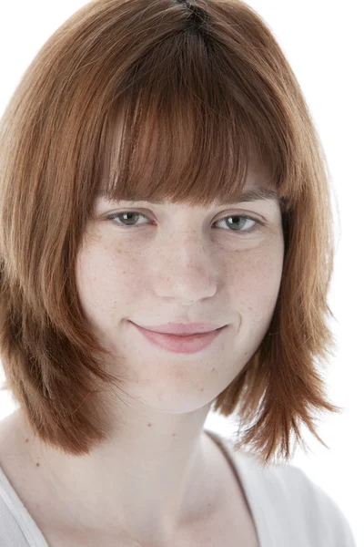 Smiling caucasian teenage girl with red hair — Stock Photo, Image