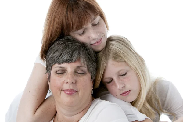 Headshot of mature mother and two daughters — Stock Photo, Image