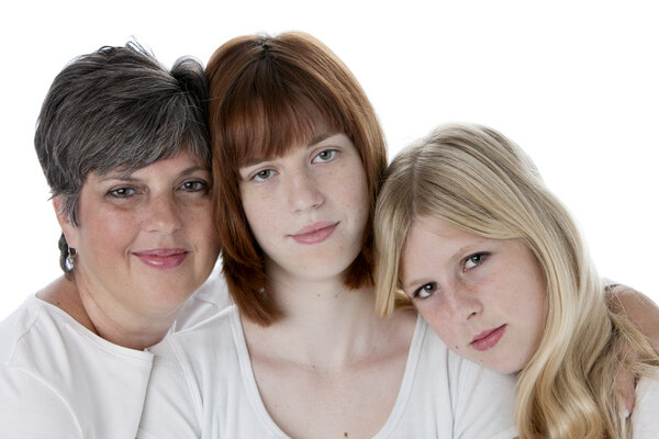 Portrait of smiling mother and two daughters