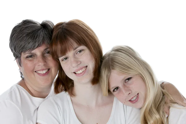 Headshot of smiling mother and two daughters — Stock Photo, Image