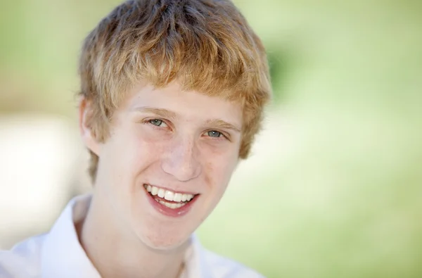 Portrait of laughing caucasian teenage boy — Stock Photo, Image